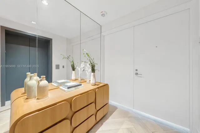 a room with a table and chairs