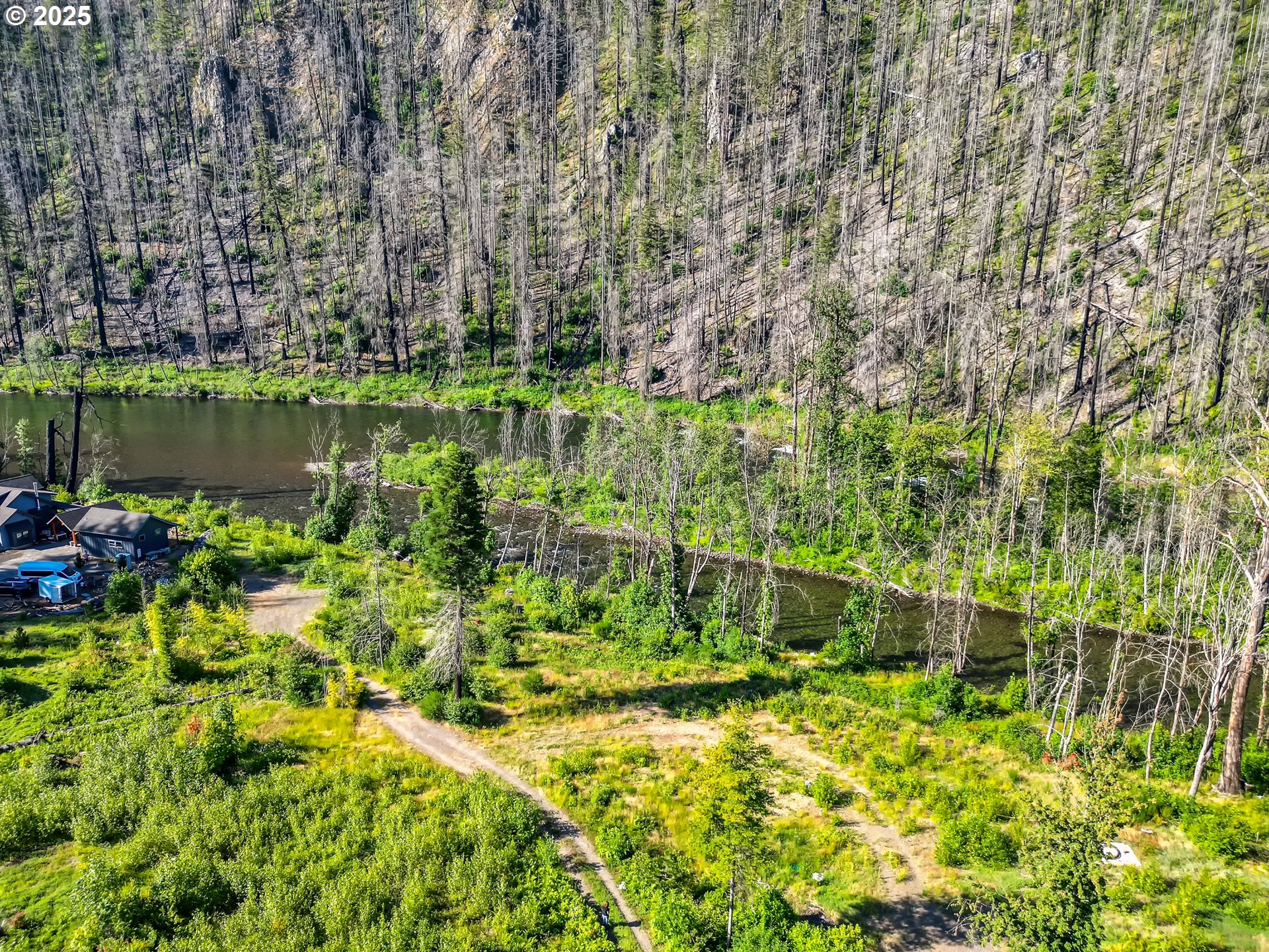 a view of a lake with a building in the background