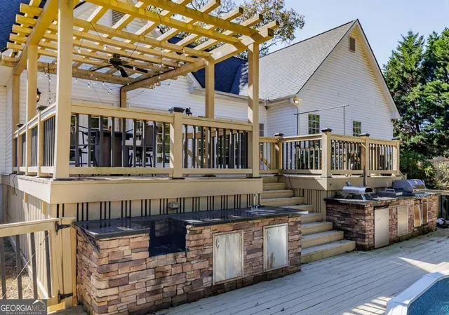 a view of a swimming pool with a patio