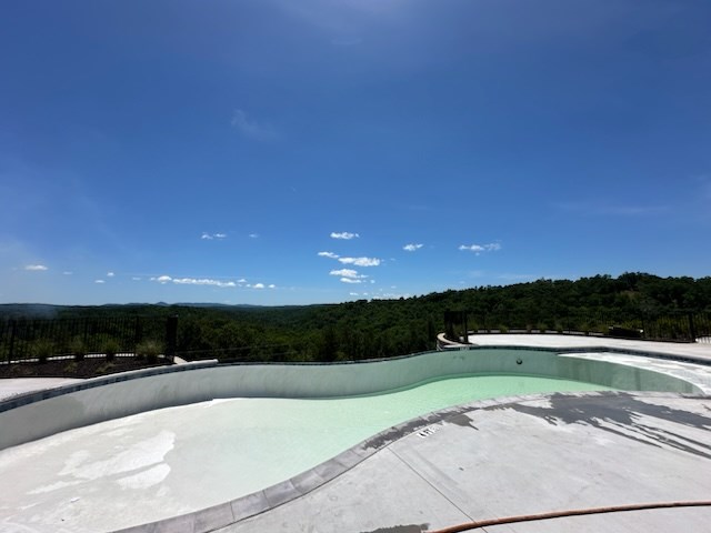 Undisclosed Address Talking Rock, GA 30175 - Photo 14 of 16 a view of a swimming pool and a yard