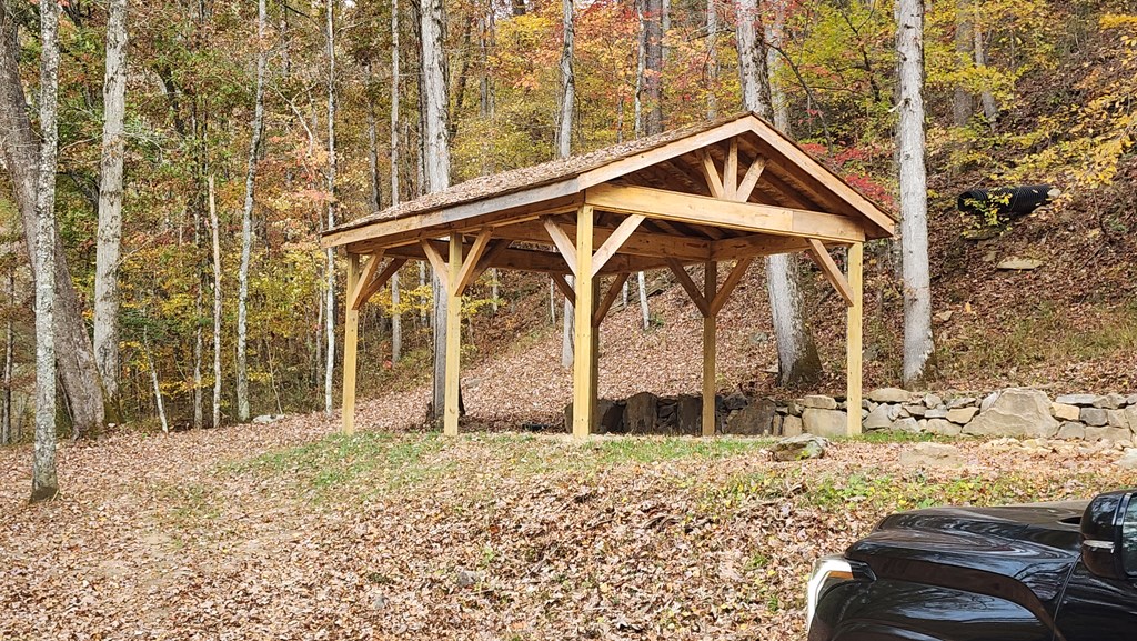 Undisclosed Address Talking Rock, GA 30175 - Photo 16 of 16 a front view of a house with a yard