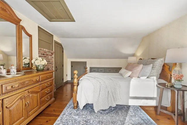 a spacious bathroom with a double vanity sink and a mirror