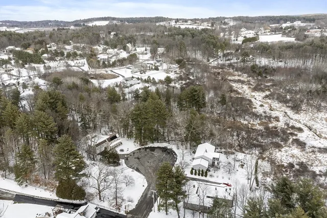 an aerial view of a city with lots of residential buildings