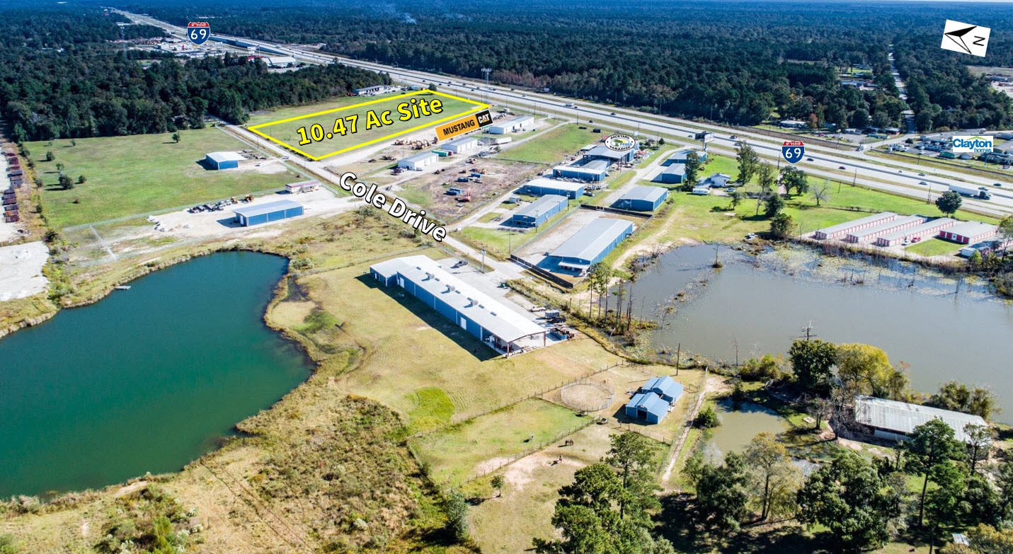 12348 Highway 59 Splendora, TX 77372 - Photo 3 of 3 an aerial view of a house with outdoor space swimming pool