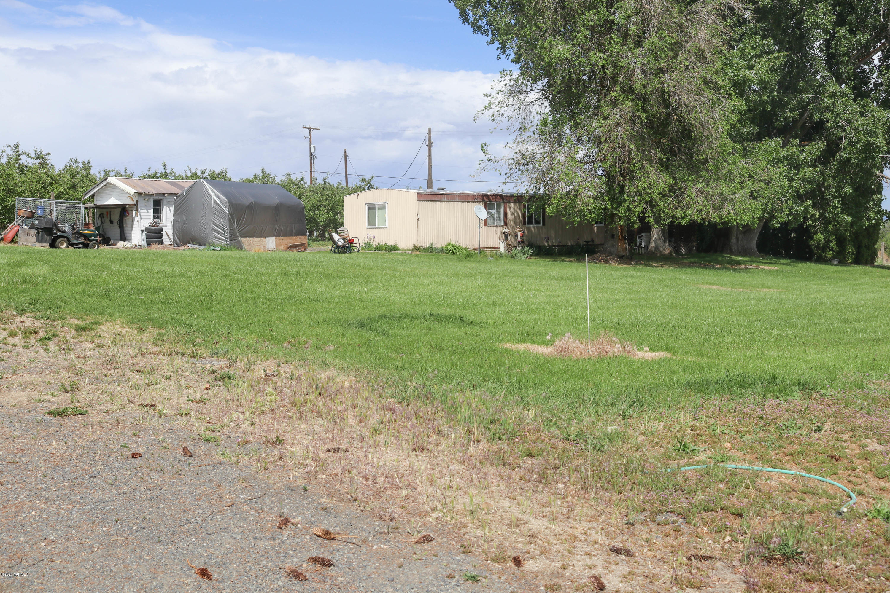 2412 Carlson Road Yakima, WA 98903 - Photo 21 of 24 a view of a house with a yard
