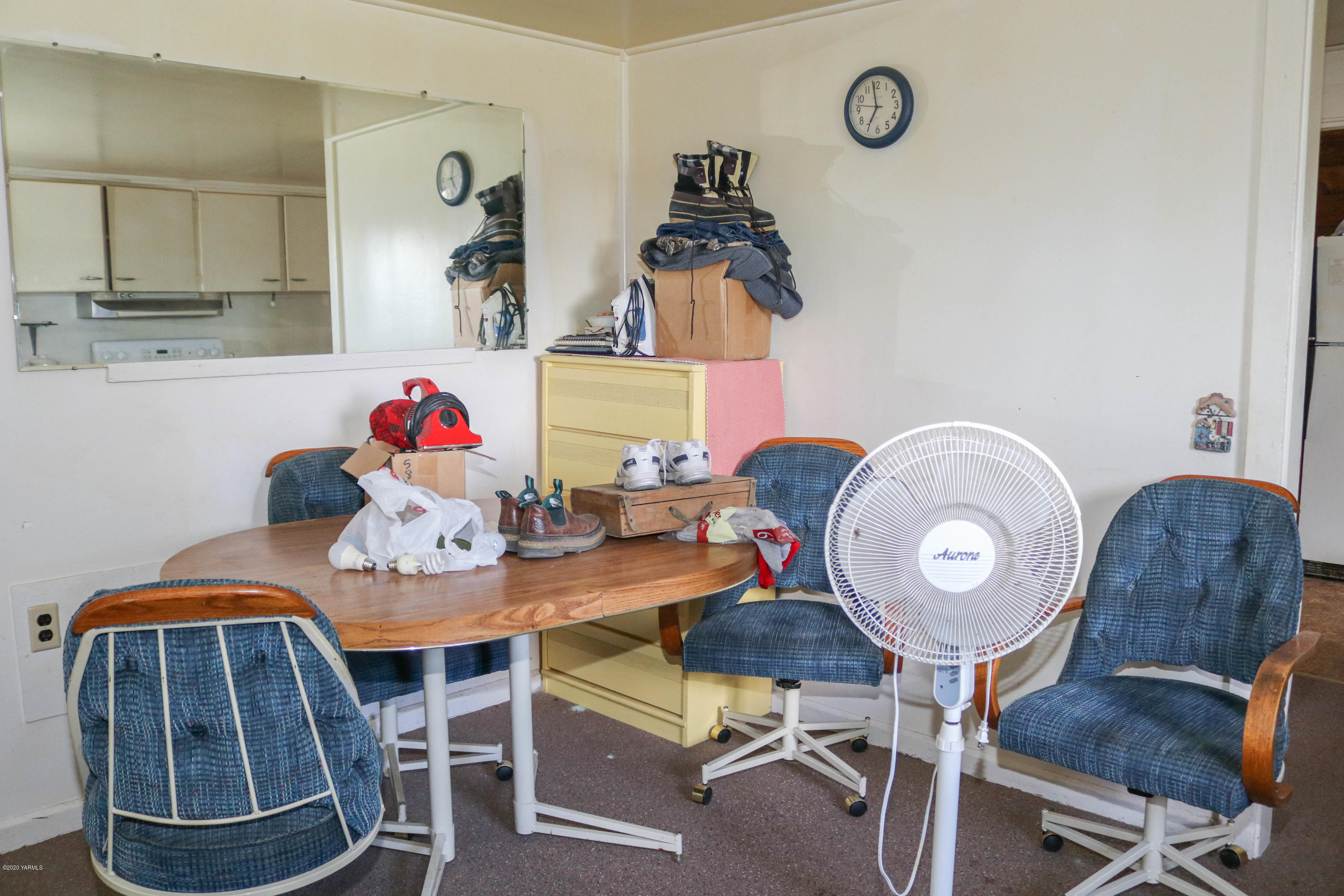 2412 Carlson Road Yakima, WA 98903 - Photo 7 of 24 a view of a dining room with furniture and wooden floor