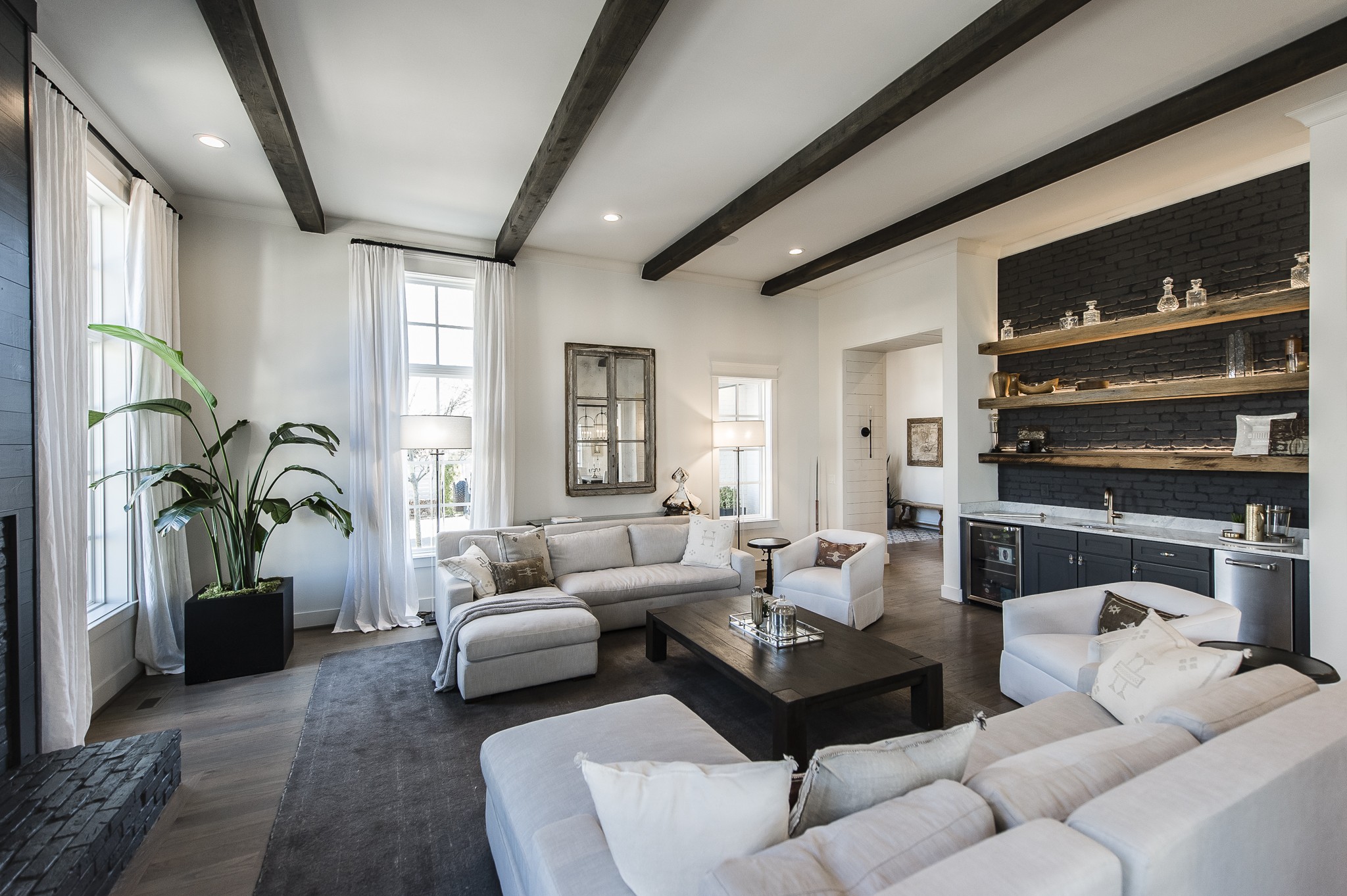 1132 Glenwood Avenue Nashville, TN 37204 - Photo 11 of 61 a living room with furniture fireplace and a potted plant