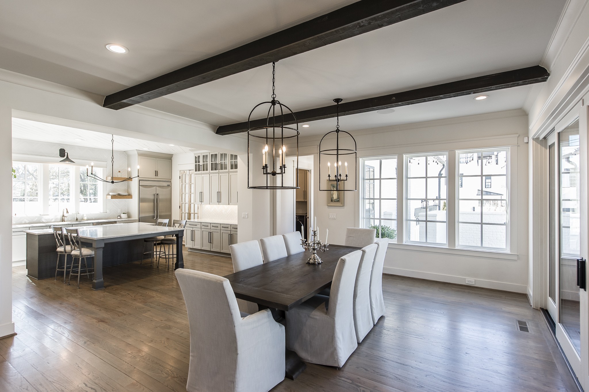 1132 Glenwood Avenue Nashville, TN 37204 - Photo 13 of 61 a view of a dining room with furniture window and wooden floor