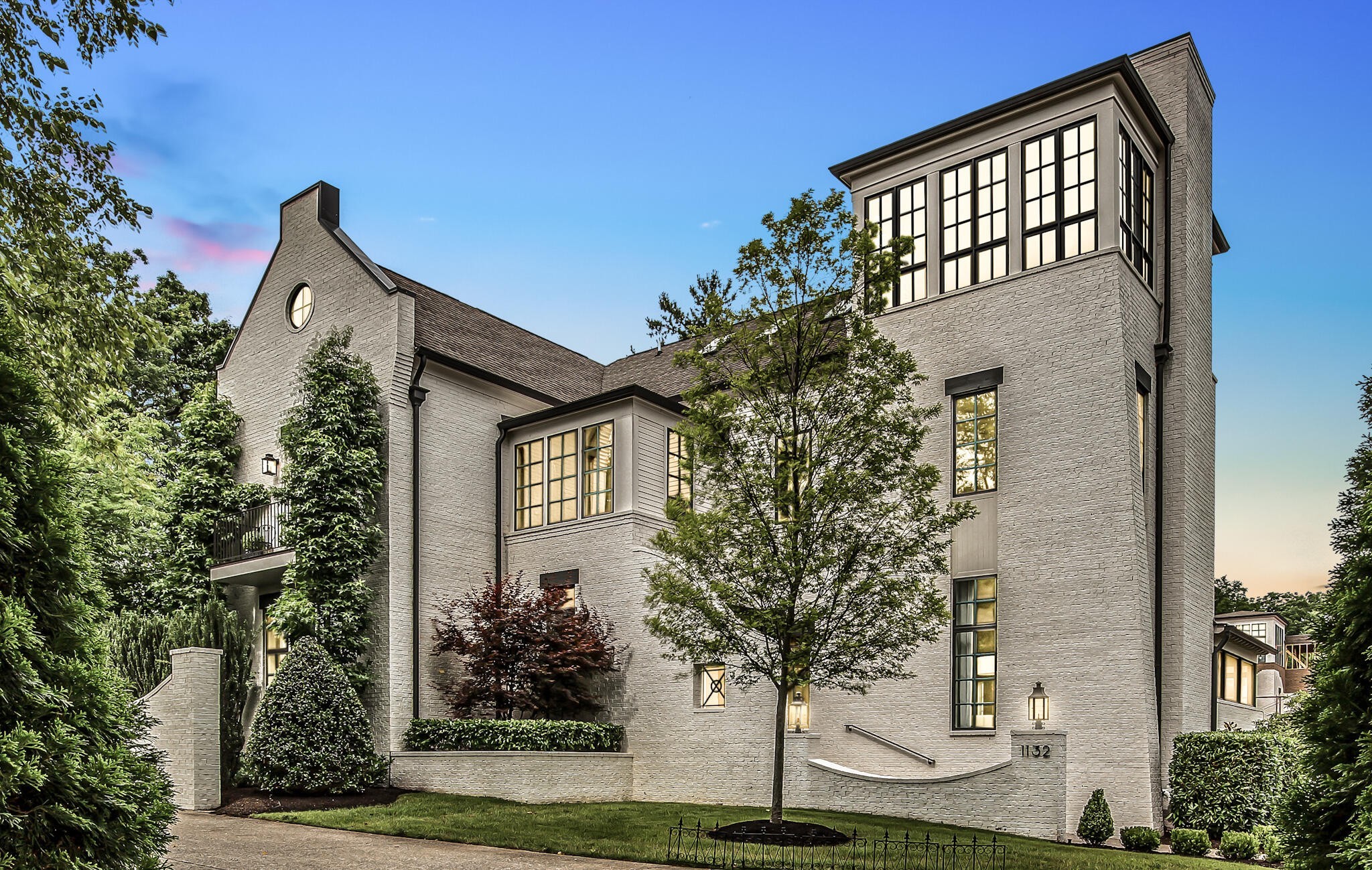 1132 Glenwood Avenue Nashville, TN 37204 - Photo 2 of 61 a front view of a house with plants