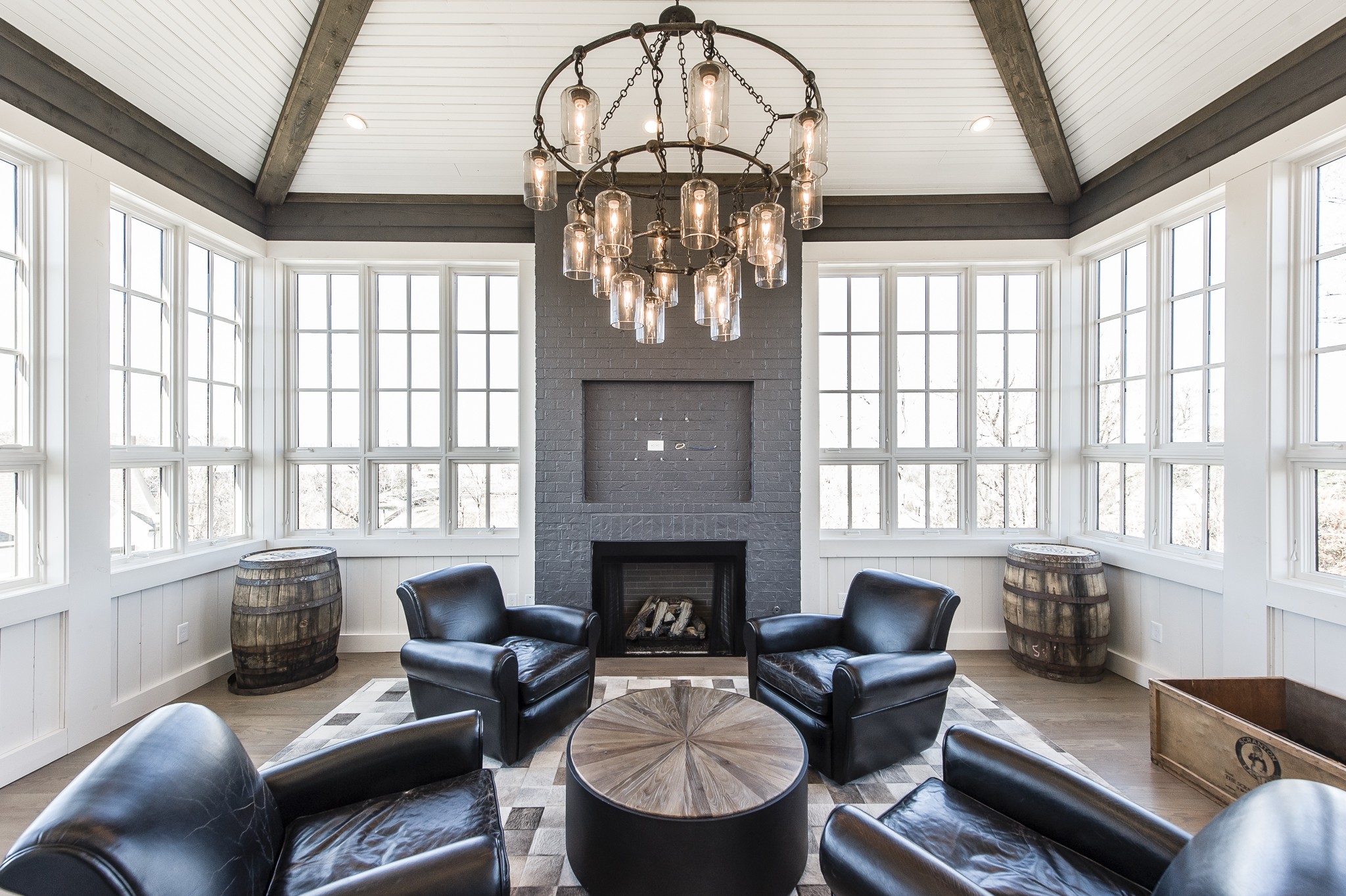 1132 Glenwood Avenue Nashville, TN 37204 - Photo 3 of 61 a living room with furniture a fireplace and large windows
