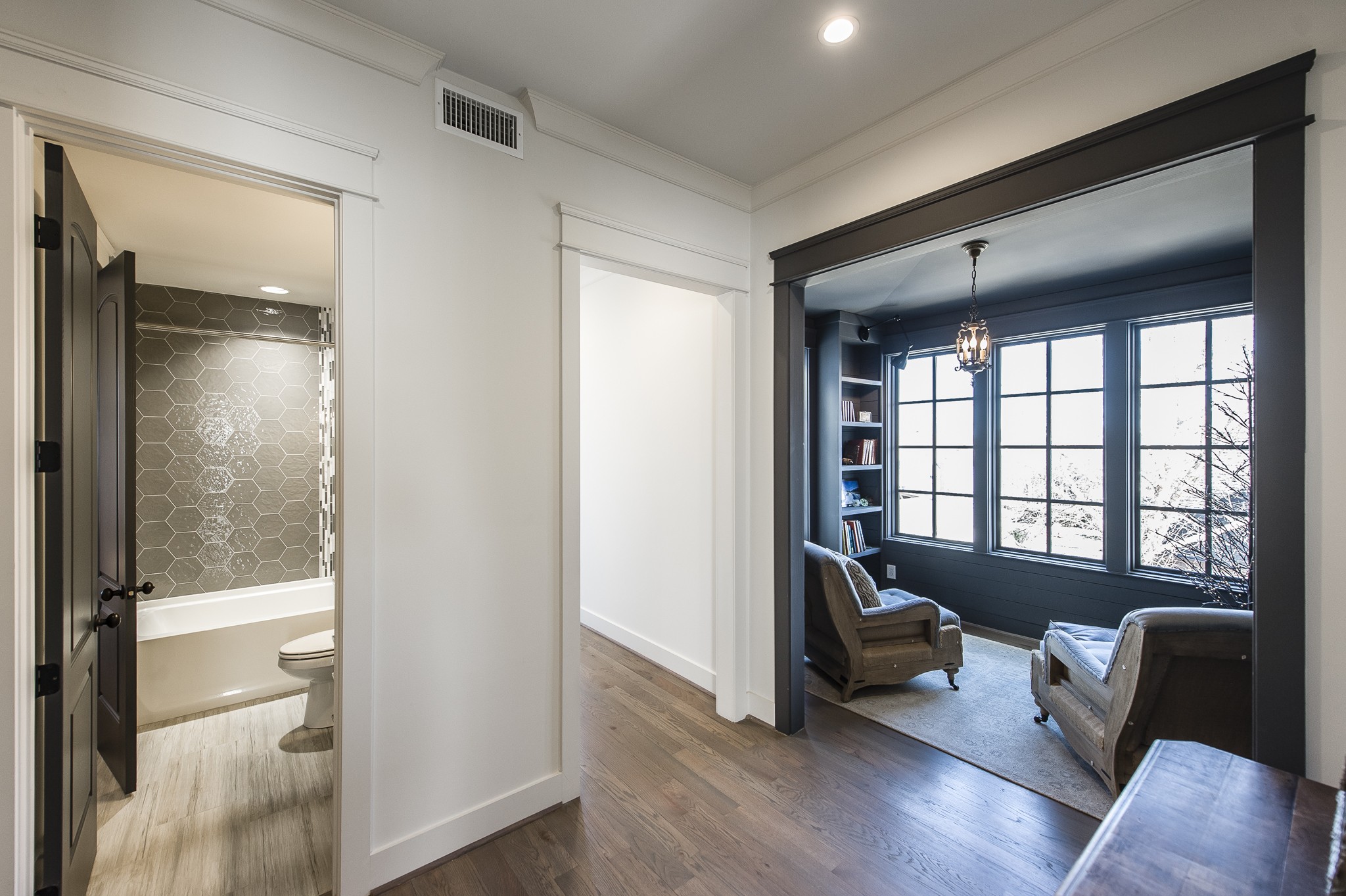 1132 Glenwood Avenue Nashville, TN 37204 - Photo 37 of 61 a living room with furniture and a window