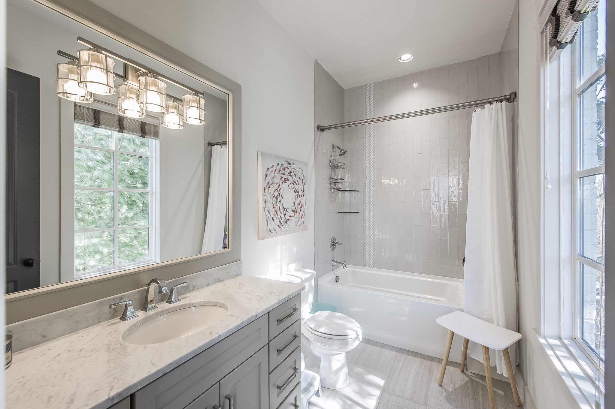 1132 Glenwood Avenue Nashville, TN 37204 - Photo 43 of 61 a bathroom with a granite countertop sink toilet and shower