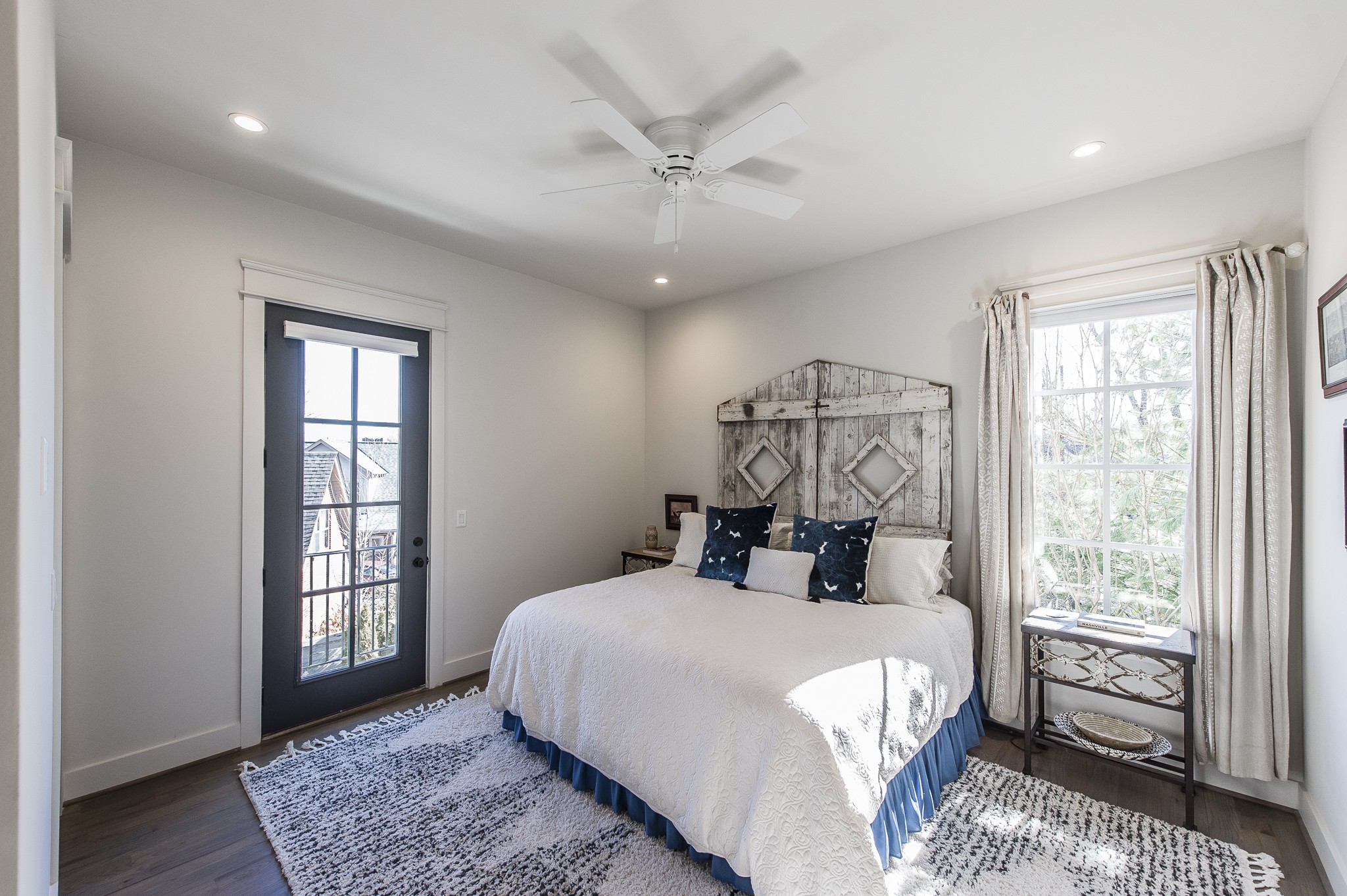 1132 Glenwood Avenue Nashville, TN 37204 - Photo 44 of 61 a bedroom with a large bed and a window