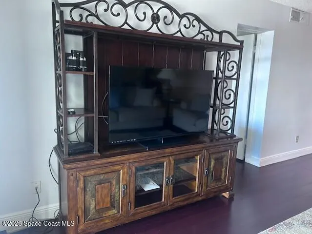 a kitchen with a stove and a microwave