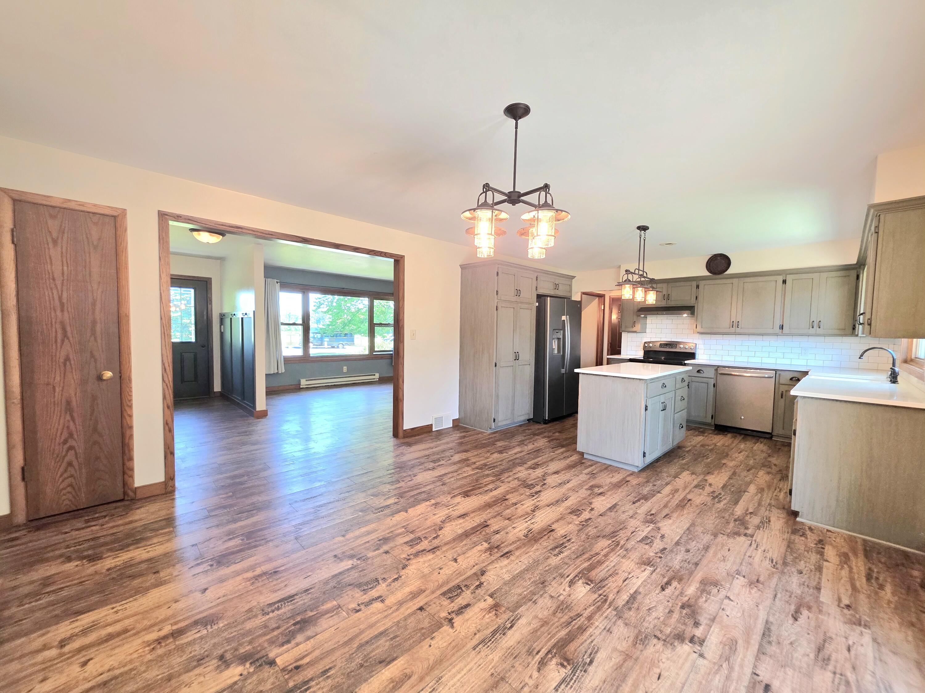 W2999 County O Road Sheboygan Falls, WI 53085 - Photo 6 of 37 Dinkng room to living room and kitchen