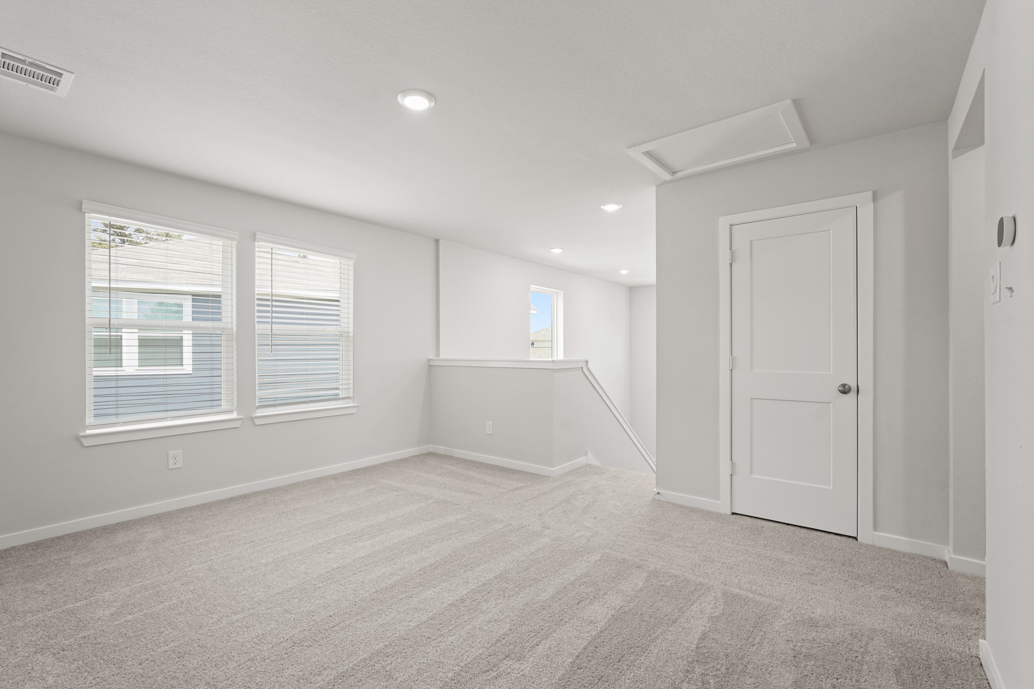213 Spring Drive Hockley, TX 77447 - Photo 16 of 26 a view of an empty room with a window