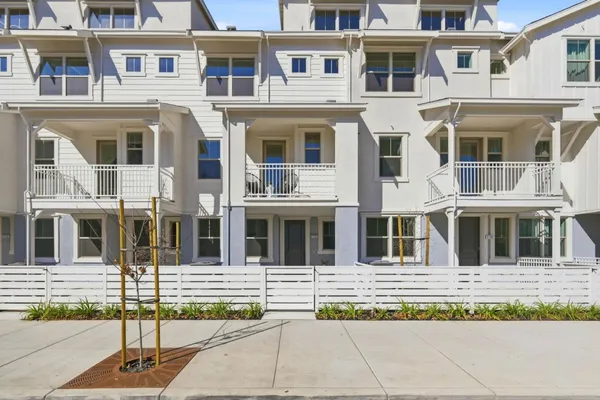 a view of a building with a street
