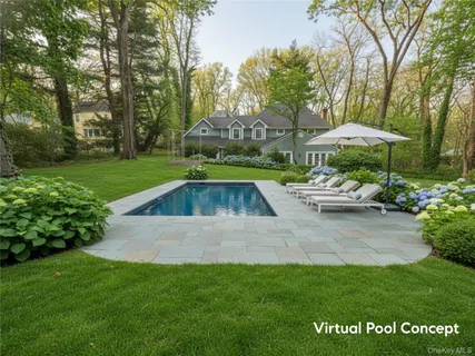 a view of backyard with swimming pool and patio
