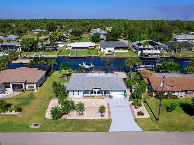 an aerial view of a house with a garden