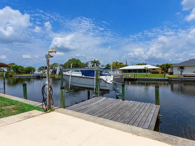 a house view with a lake view
