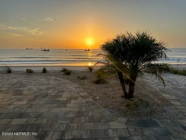 a kitchen with a sink cabinets and window