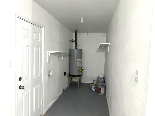 a view of a room with shelves