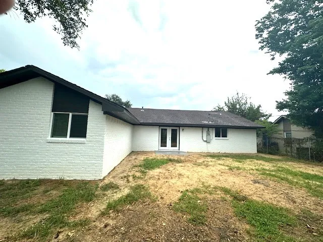 a front view of house with yard