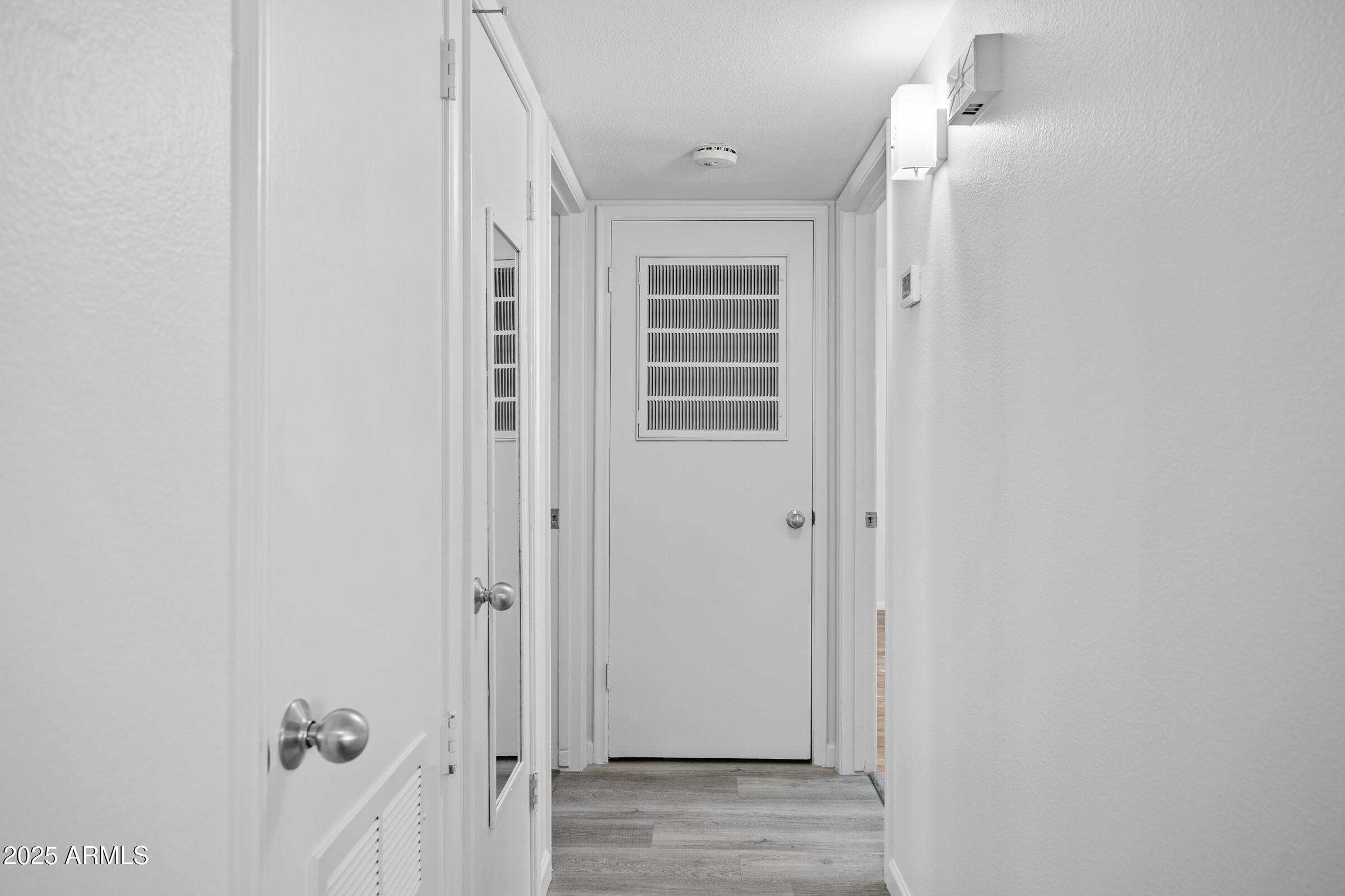 1614 West Inverness Drive Tempe, AZ 85282 - Photo 15 of 27 a view of a hallway with closet and a window