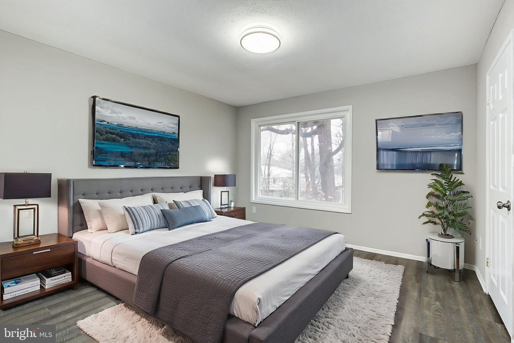 2394 Southgate Square Reston, VA 20191 - Photo 20 of 58 a bedroom with bed and a couch