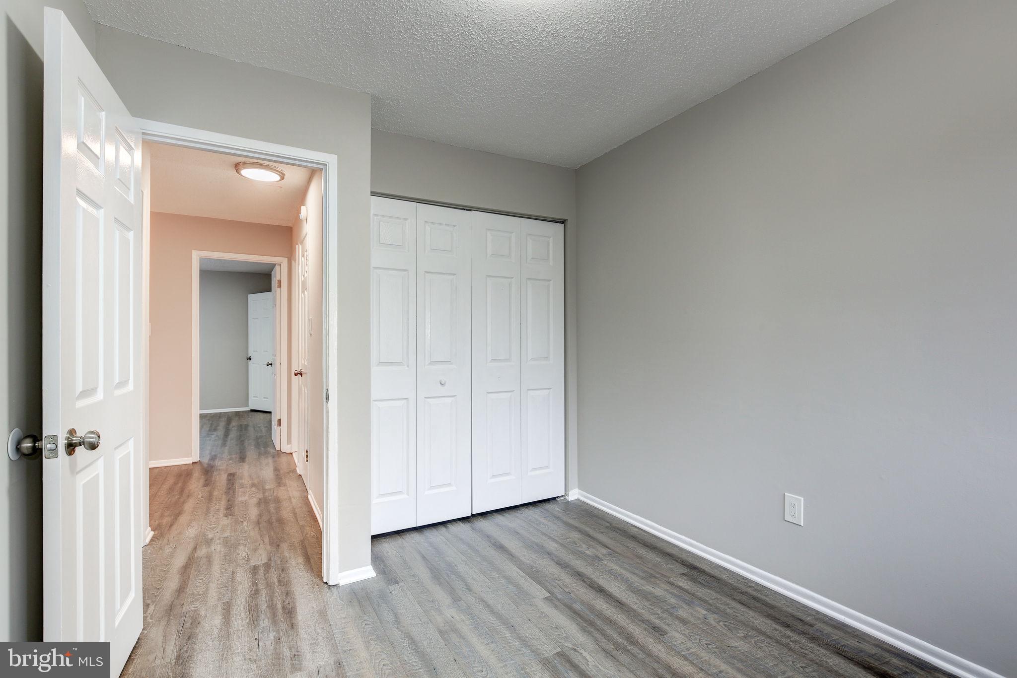 2394 Southgate Square Reston, VA 20191 - Photo 34 of 58 wooden floor in a gallery