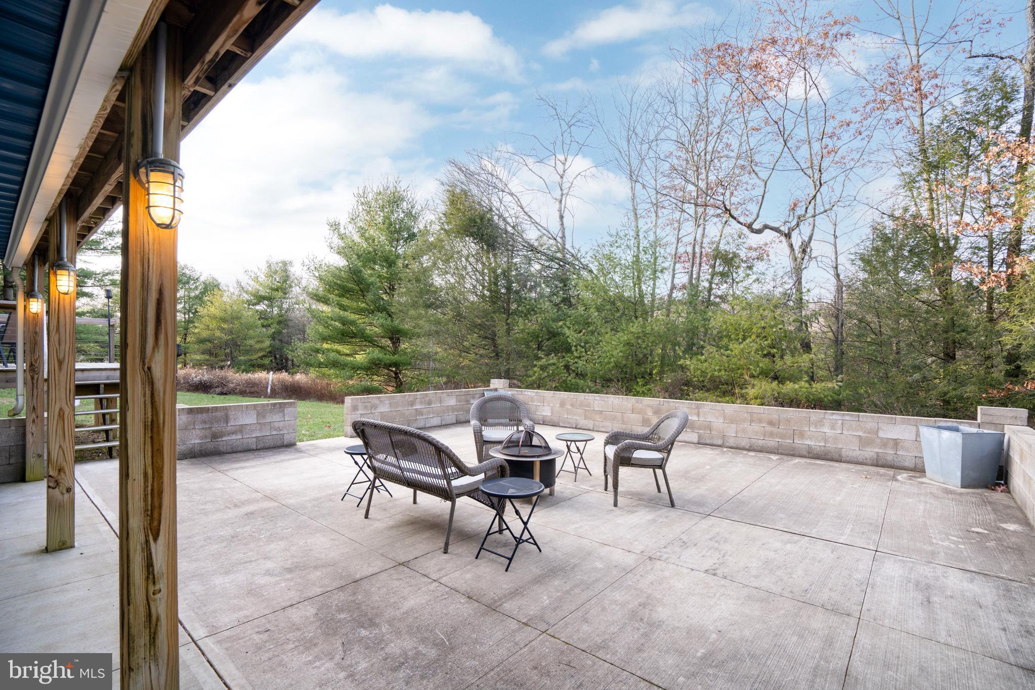 512 Decker Valley Road Spring Mills, PA 16875 - Photo 14 of 66 a view of backyard with seating area and green space
