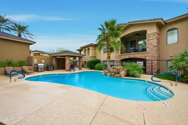 a front view of house and yard with swimming pool and porch