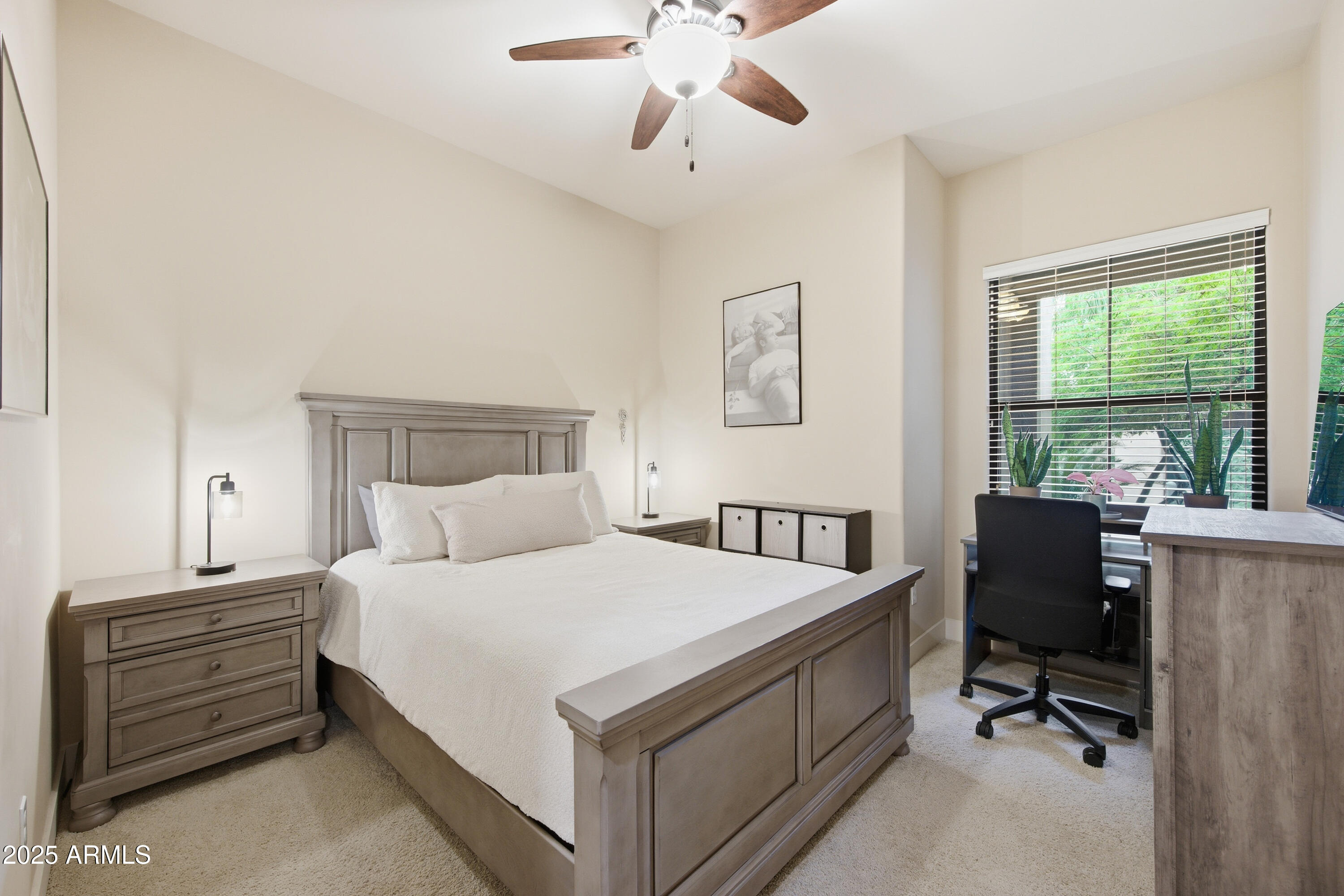 15550 South 5th Avenue, Unit 159 Phoenix, AZ 85045 - Photo 21 of 44 a bedroom with a bed and a desk