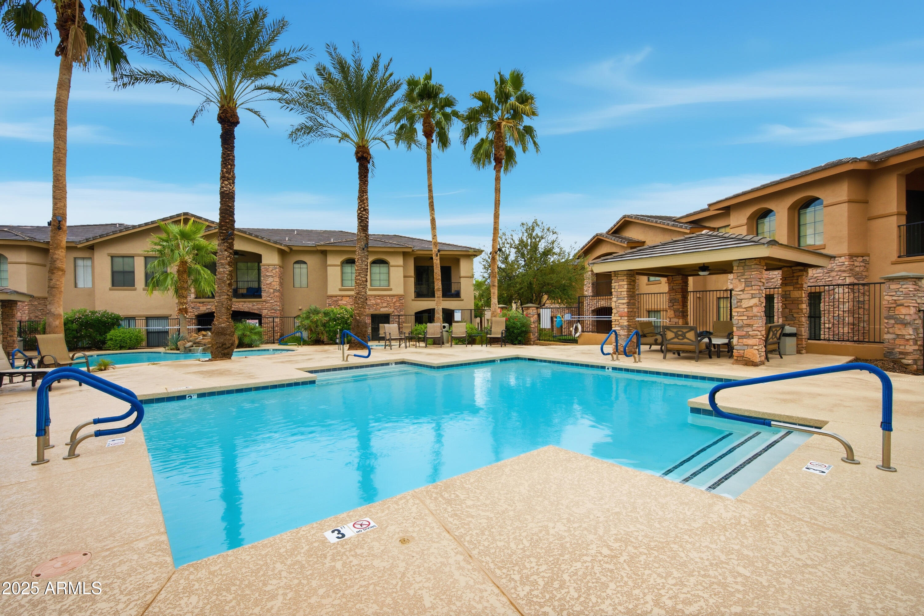 15550 South 5th Avenue, Unit 159 Phoenix, AZ 85045 - Photo 23 of 44 a view of a house with swimming pool and sitting area