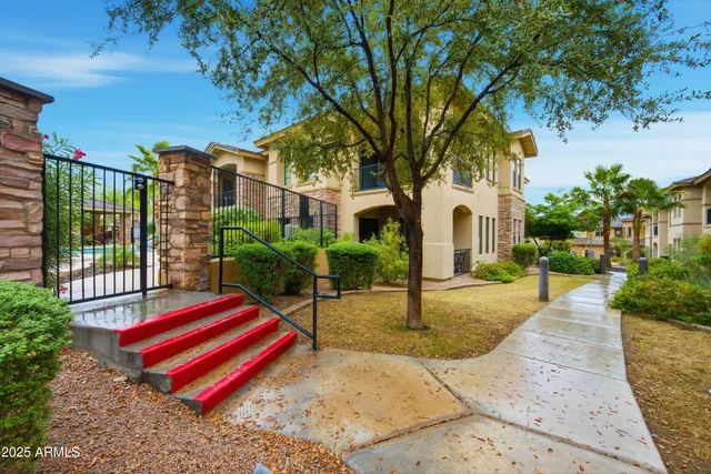 a view of yard with patio
