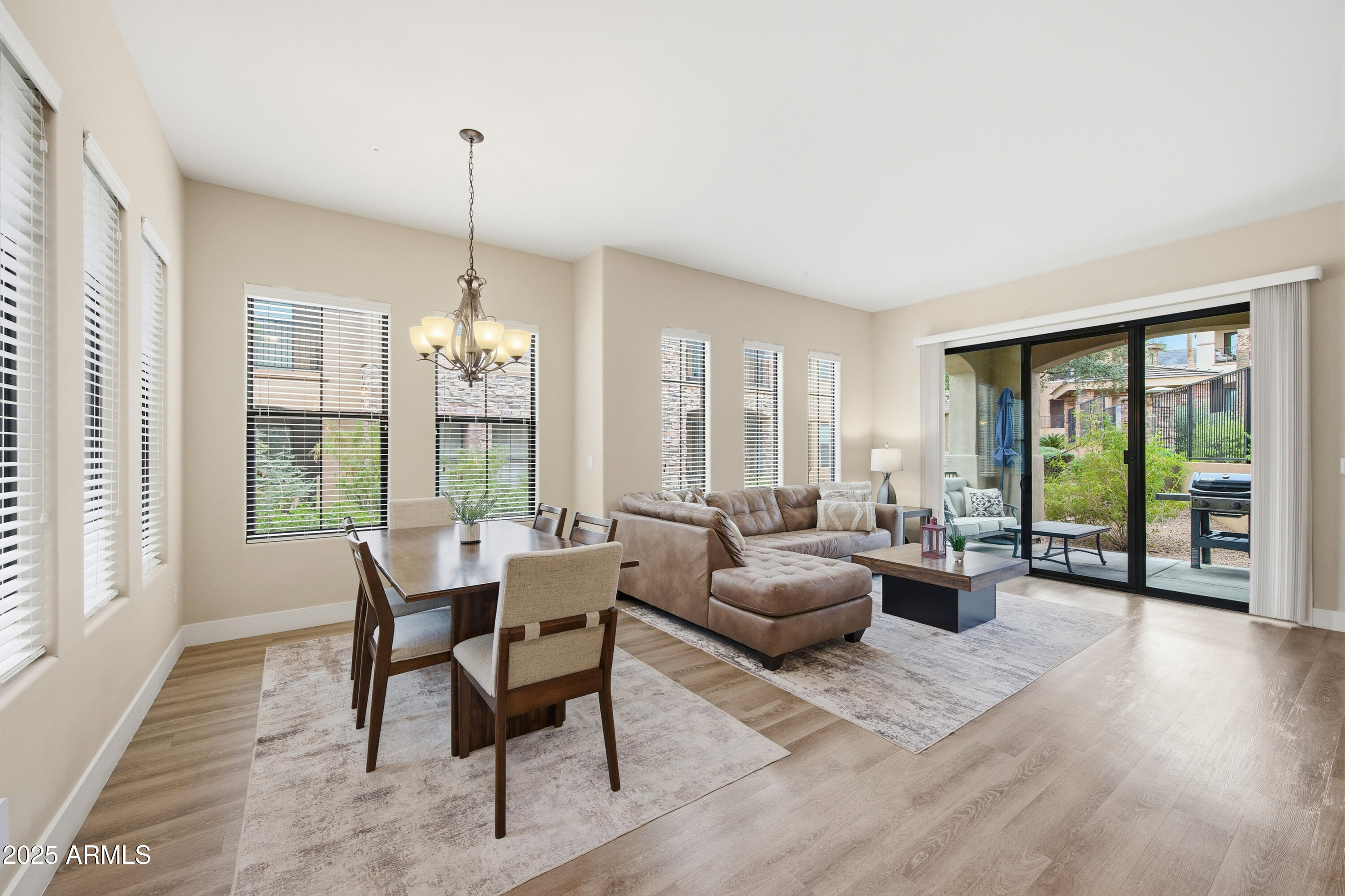15550 South 5th Avenue, Unit 159 Phoenix, AZ 85045 - Photo 3 of 44 a living room with furniture and a large window