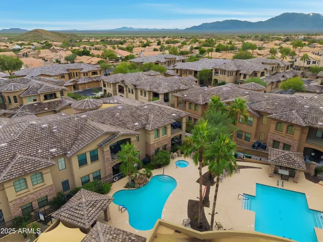 a view of city with tall buildings