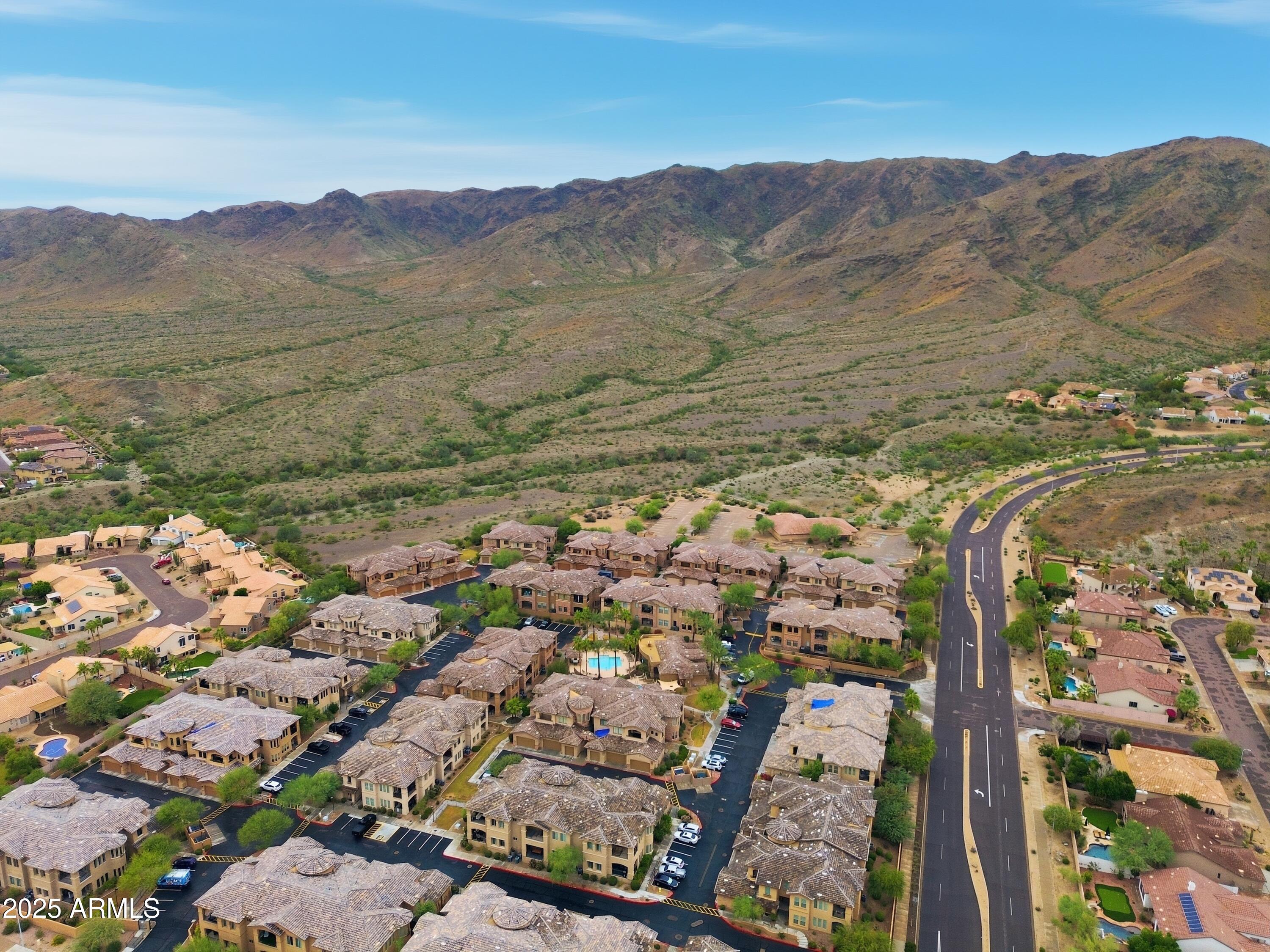 15550 South 5th Avenue, Unit 159 Phoenix, AZ 85045 - Photo 40 of 44 a view of a city with mountains in the background