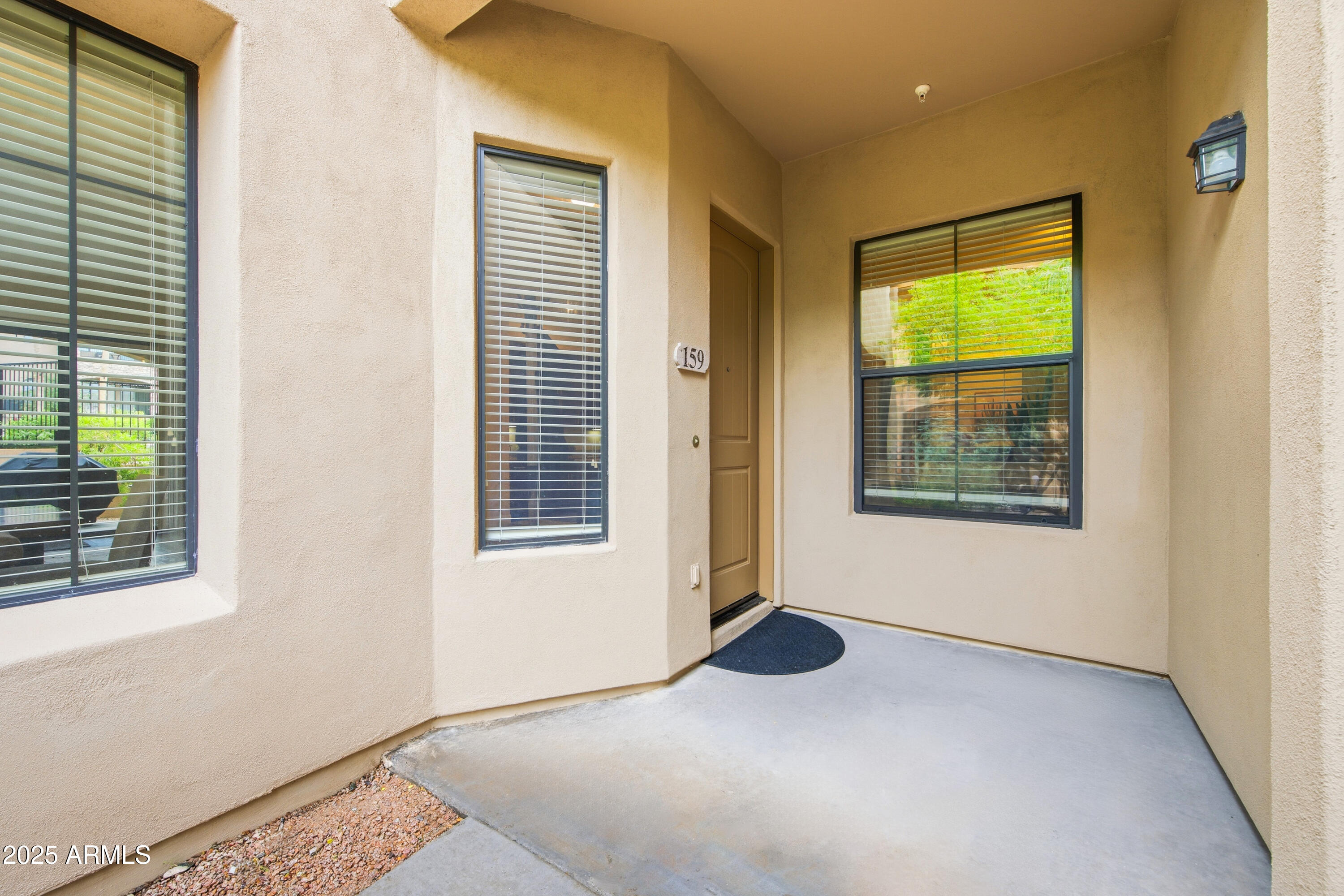 15550 South 5th Avenue, Unit 159 Phoenix, AZ 85045 - Photo 7 of 44 a view of an empty room with a window