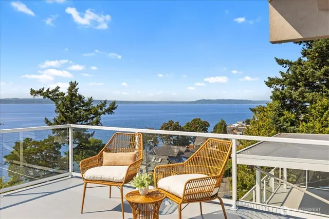 a view of a chairs and table on the terrace