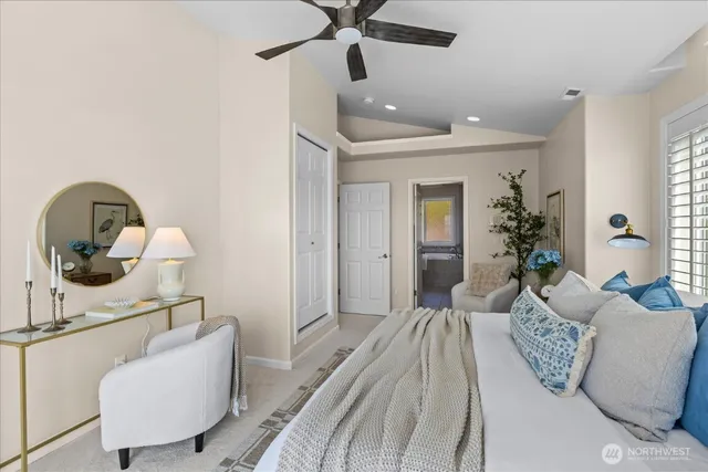 a bedroom with a bed and window