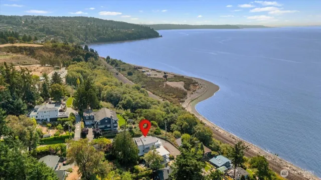 a view of a pathway both side of house with yard