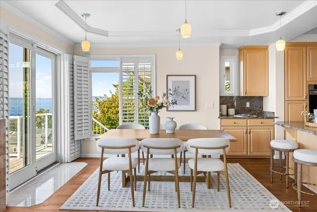 a dining room with furniture and window
