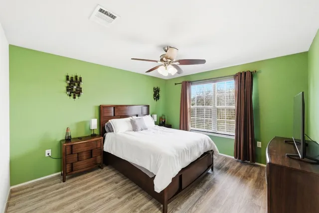 a kitchen with a table and chairs in it