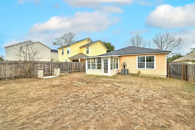a view of a room with a large window