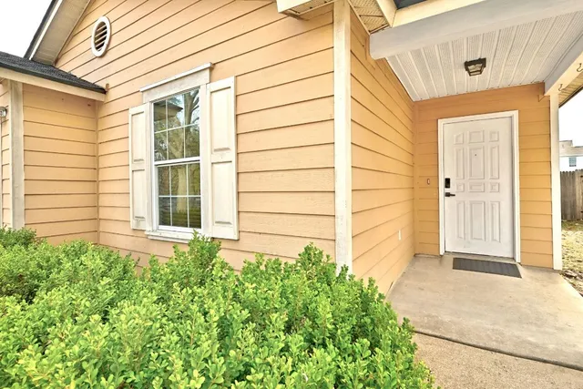 front view of a house with a big yard