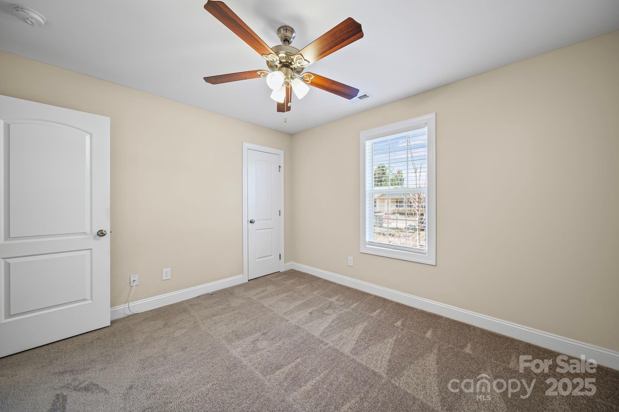 157 Crescent Street Kannapolis, NC 28081 - Photo 28 of 36 a view of an empty room with a window