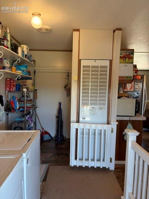 8084 Oak Drive Rye, CO 81069 - Photo 22 of 39 Mudroom/Laundry with gate to close off space for pets or littles.