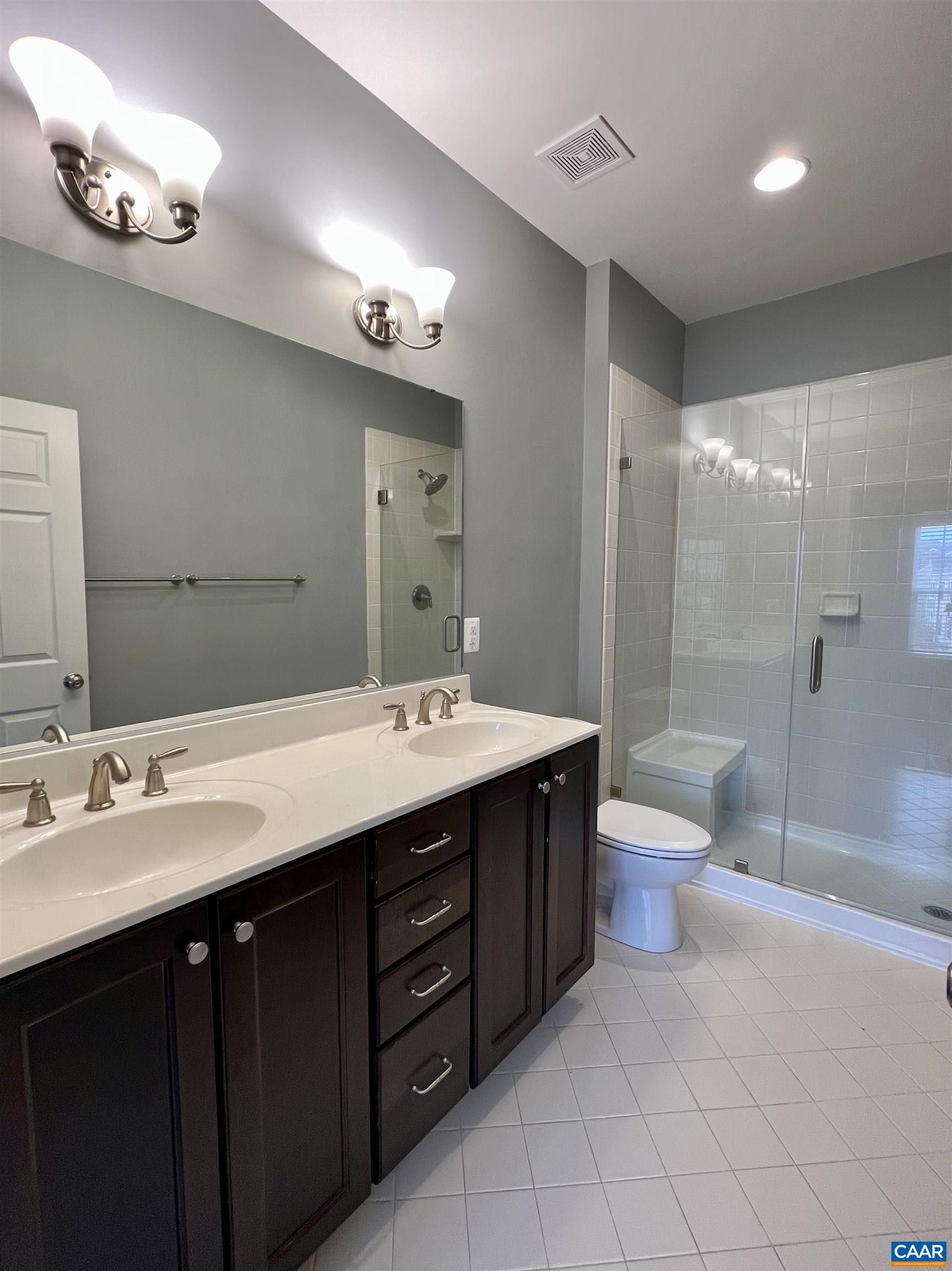 2545 Avemore Pond Road Charlottesville, VA 22911 - Photo 7 of 17 a spacious bathroom with a double vanity sink mirror double and toilet