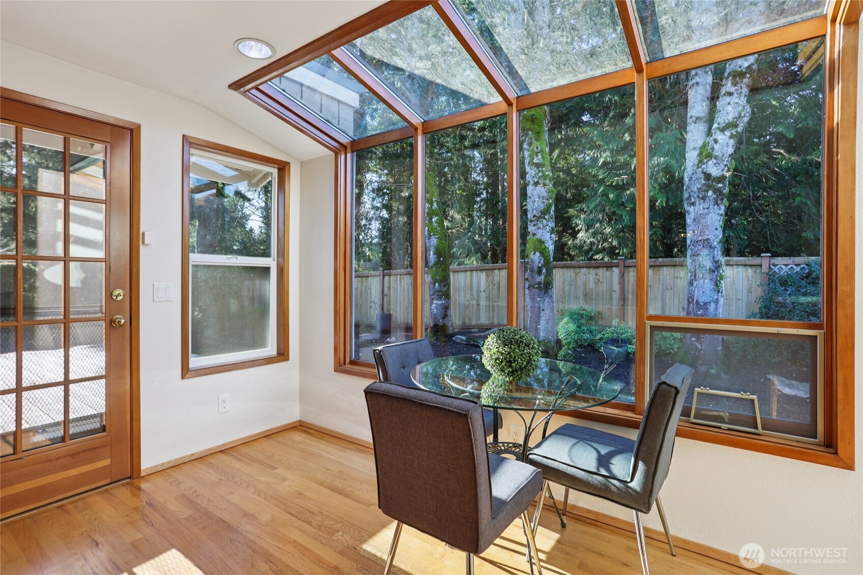 16535 147th Avenue Southeast Renton, WA 98058 - Photo 11 of 37 a outdoor living space with furniture and garden view